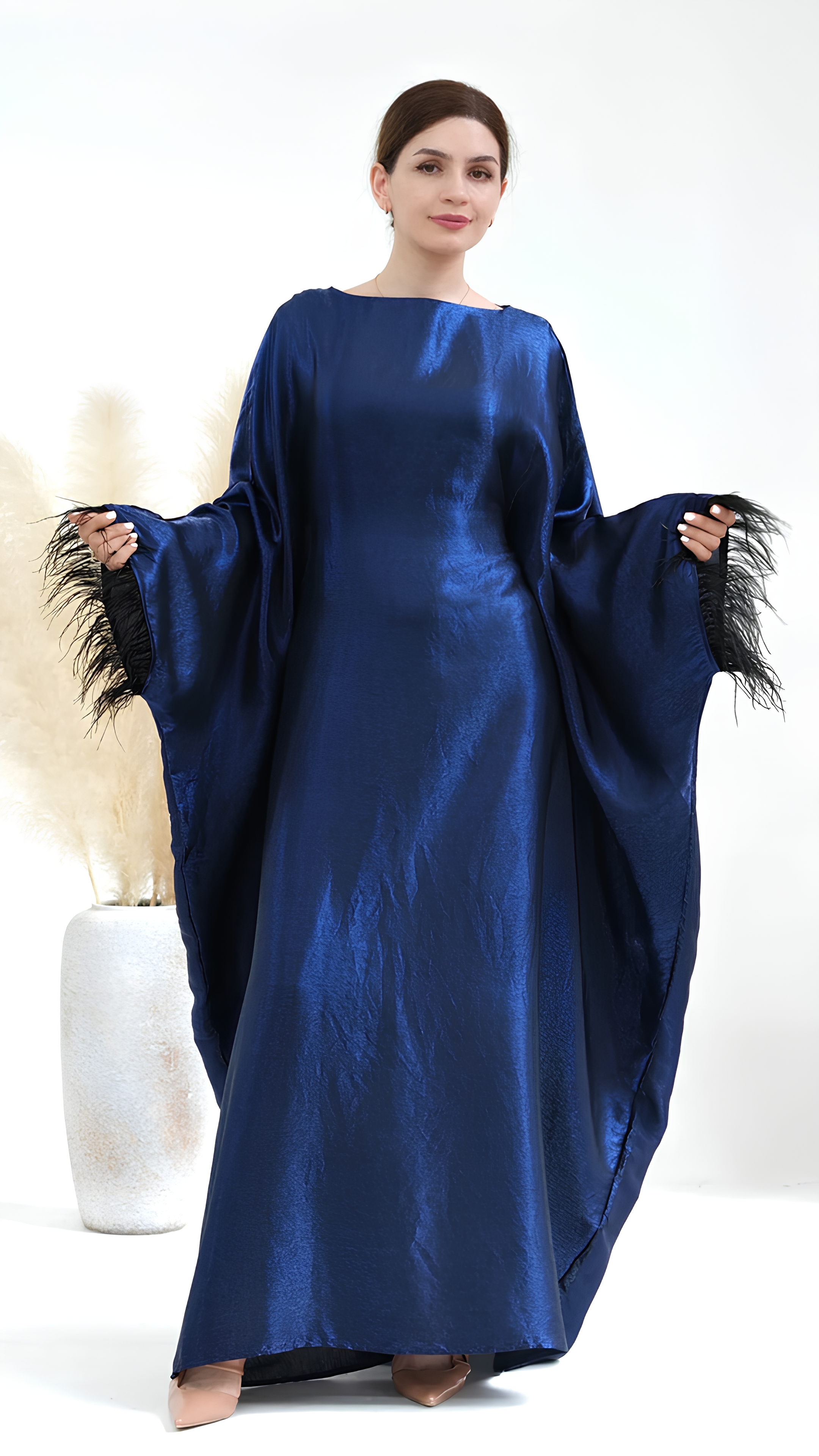 Abaya à plumes fermées