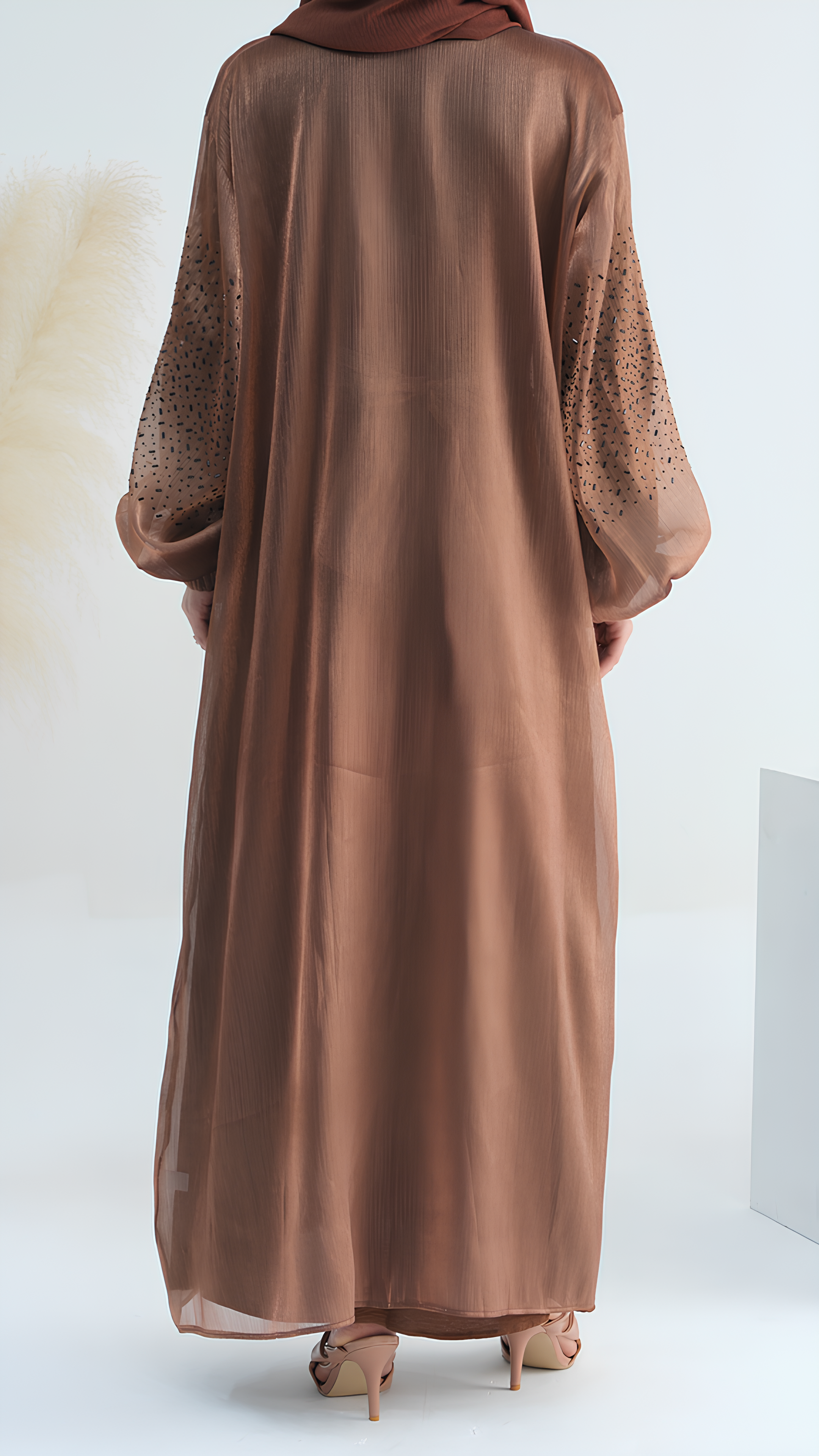 Abaya mit himmlischem Charme